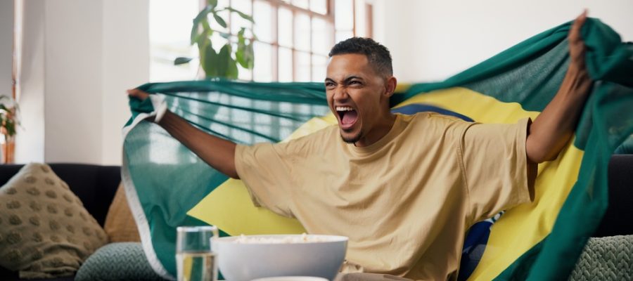 Man,,Brazil,Flag,And,Celebration,In,Home,,Soccer,And,Excited